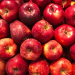 A vibrant collection of fresh red apples showcasing healthy abundance.